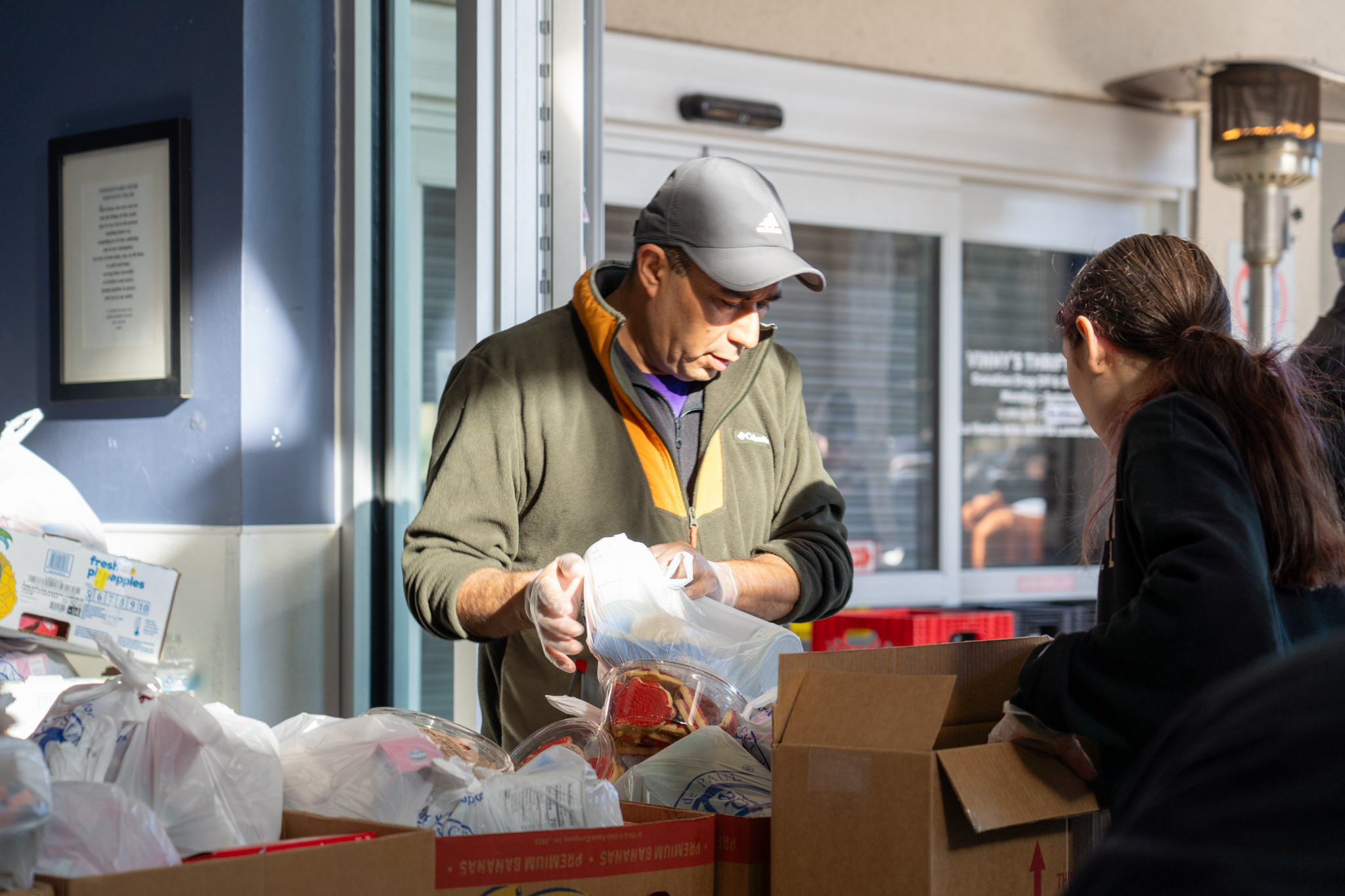 St. Vincent de Paul volunteers working to distribute food.