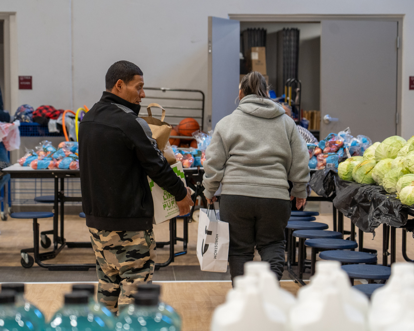 Neighbors shop at the Healing Project distribution.
