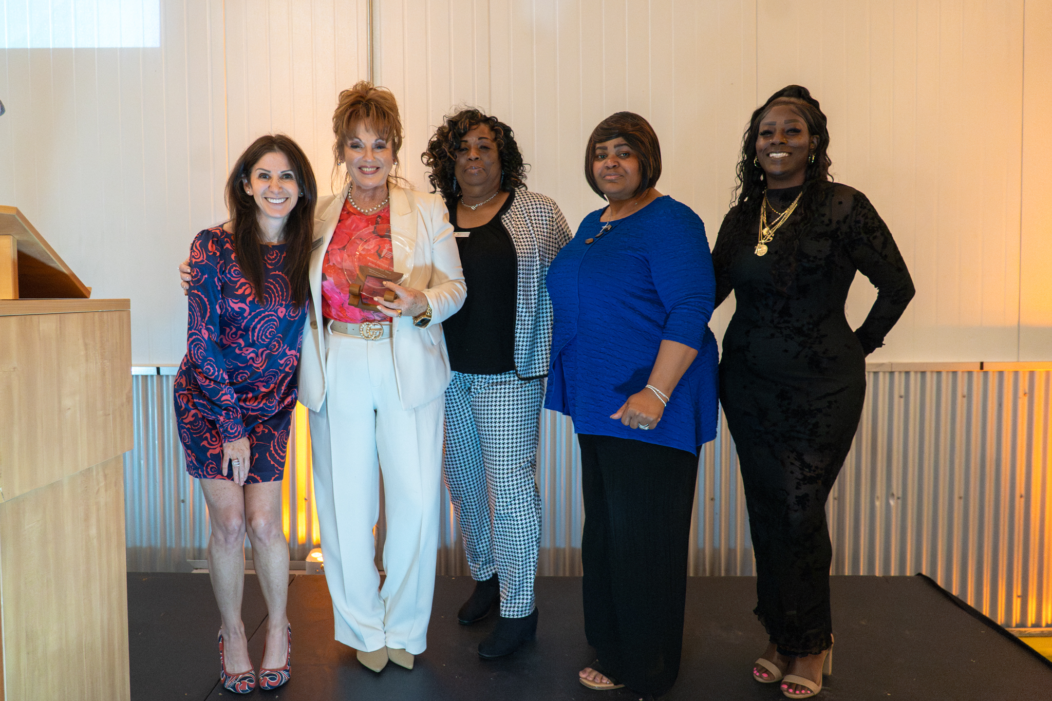 ASYMCA accepts Hunger Heroes award.